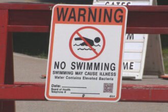 No Swimming Sign Beach Closed Bacteria.jpg