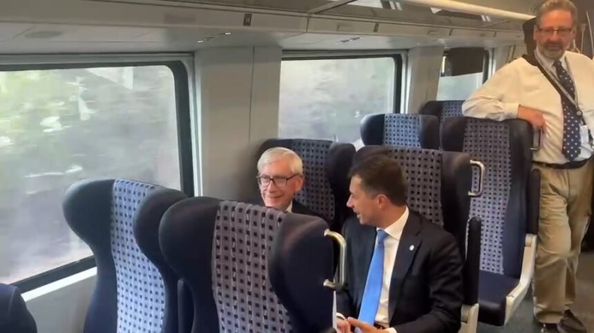 74624188007 Buttigieg Evers Amtrack Karnopp.jpg