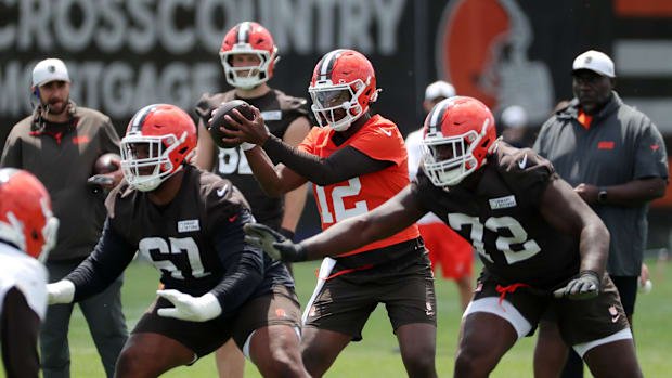 Browns quarterback Shedeur Sanders takes a snap during minicamp, Tuesday, June 10, 2025, in Berea.