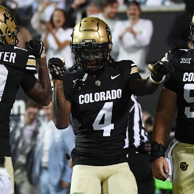 Sep 21, 2024; Boulder, Colorado, USA; Colorado Buffaloes wide receiver Omarion Miller (4) celebrates with teammates after a t
