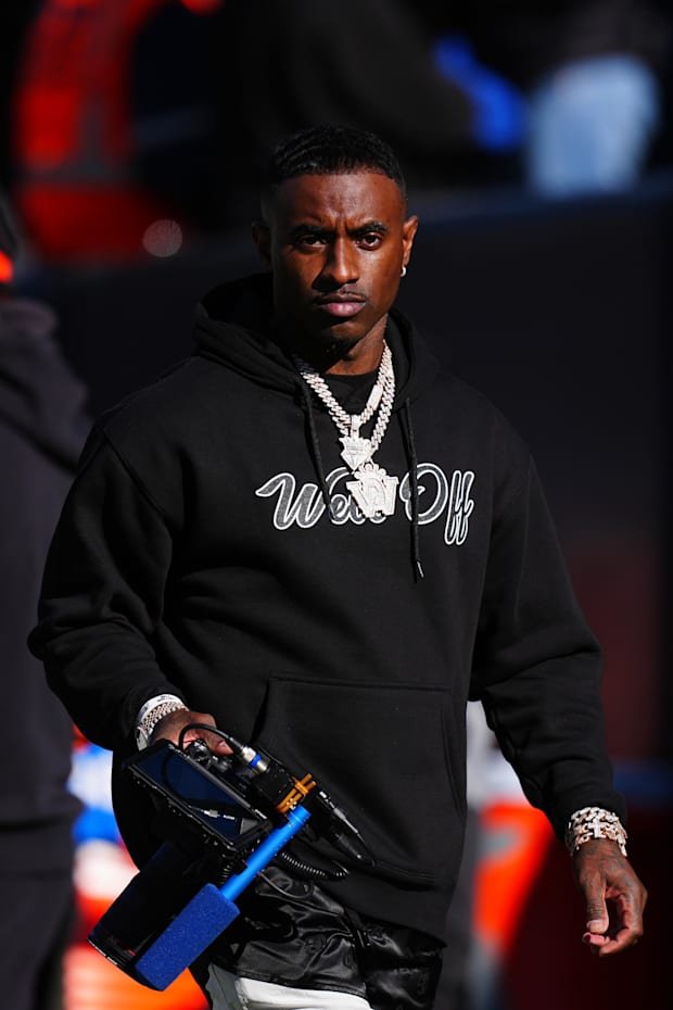 Nov 29, 2024; Boulder, Colorado, USA; Colorado Buffaloes social media producer Deion Sanders Jr. walks the sidelines in the s