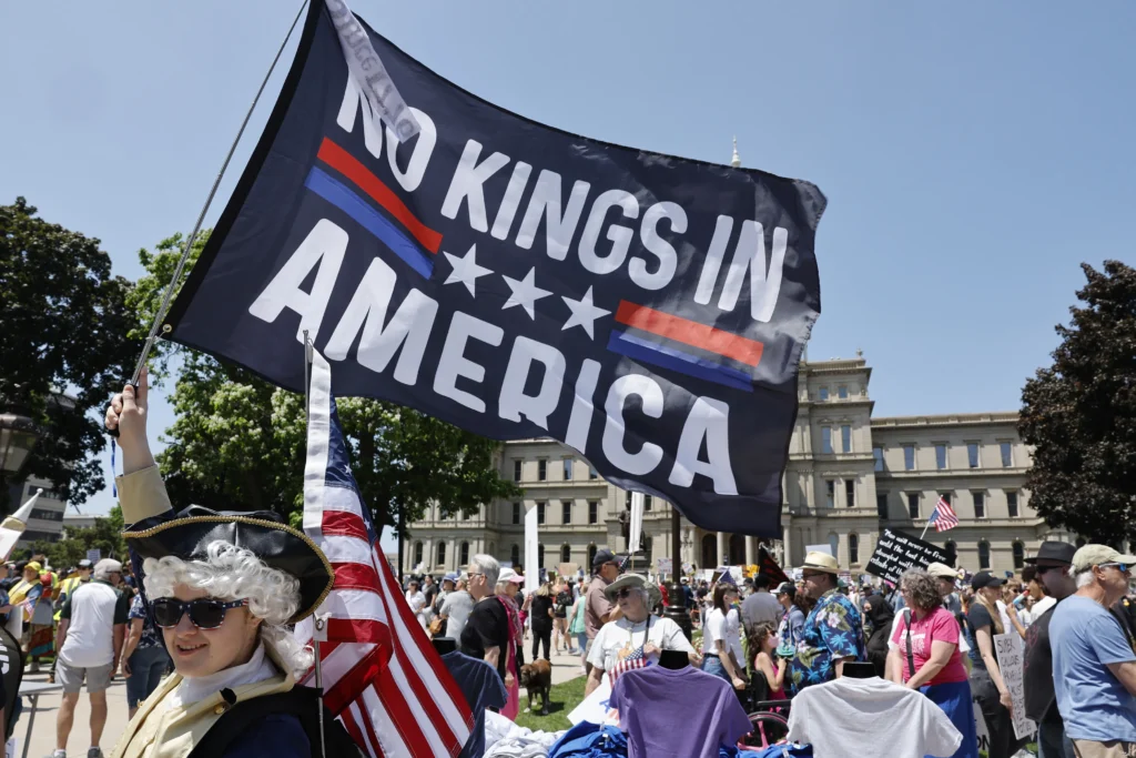 People take part in a "No Kings" protest outside the Michigan Capitol in Lansing, Michigan. Photo: Jeff Kowalsky/AFP via Getty Images