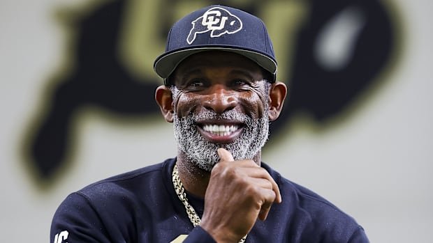 Apr 4, 2025; Boulder, CO, USA; Colorado Buffaloes head coach Deion Sanders watches as his players go through drills at the Un