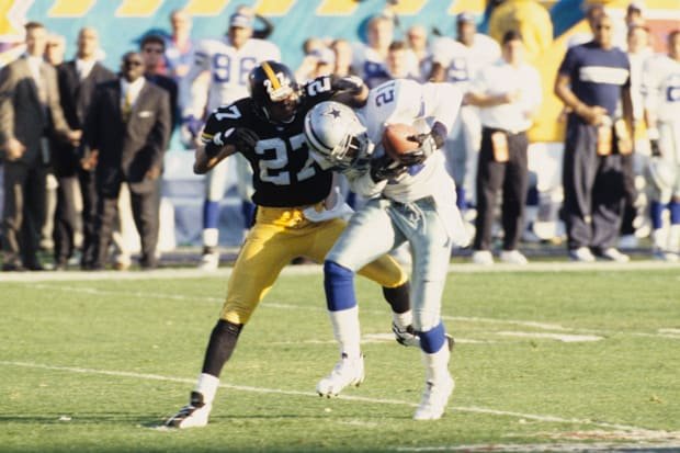 Jan 28, 1996; Tempe, AZ, USA; FILE PHOTO; Dallas Cowboys receiver Deion Sanders (21) catches a pass against Pittsburgh Steele