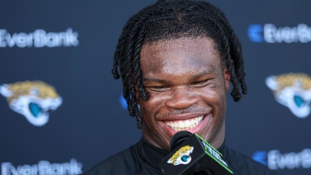 Jul 25, 2025; Jacksonville, FL, USA; Jacksonville Jaguars wide receiver Travis Hunter (12) talks to media after training camp