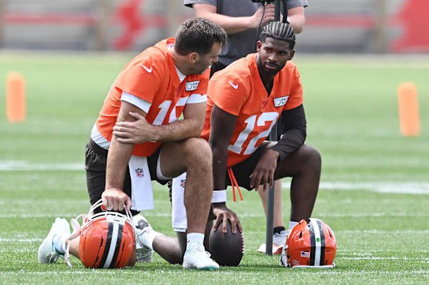 Jun 10, 2025; Berea, OH, USA; Cleveland Browns quarterback Joe Flacco (15) talks to quarterback Shedeur Sanders (12) during m
