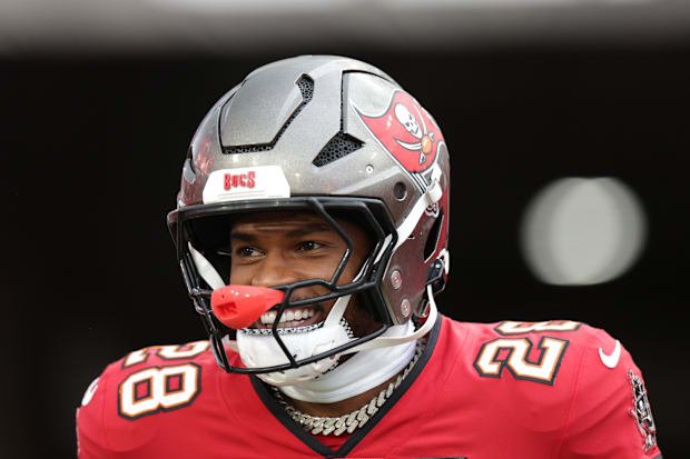 Aug 9, 2025; Tampa, Florida, USA; Tampa Bay Buccaneers safety Shilo Sanders (28) takes the field for warmups before a preseas