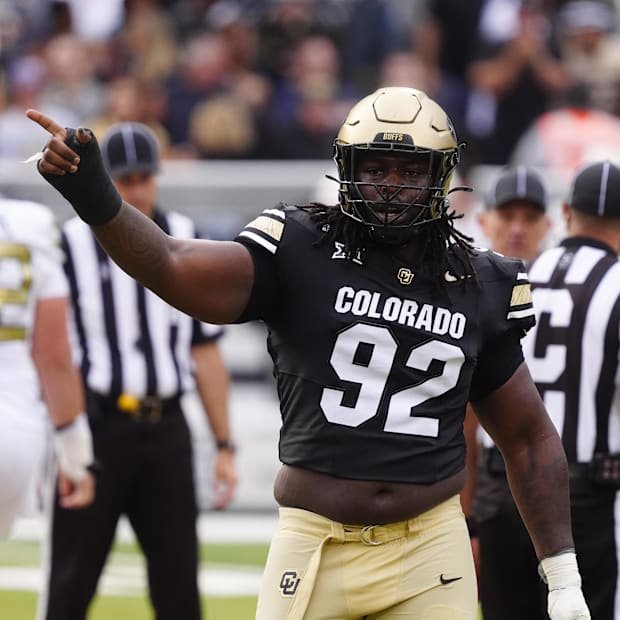 Aug 29, 2025; Boulder, Colorado, USA; Colorado Buffaloes defensive tackle Anquin Barnes Jr. (92) reacts to a turnover in the 