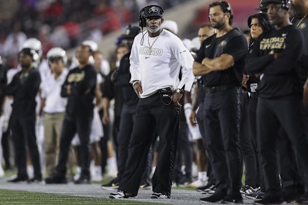 Sep 12, 2025; Houston, Texas, USA; Colorado Buffaloes head coach Deion Sanders watches from the sideline during the third qua