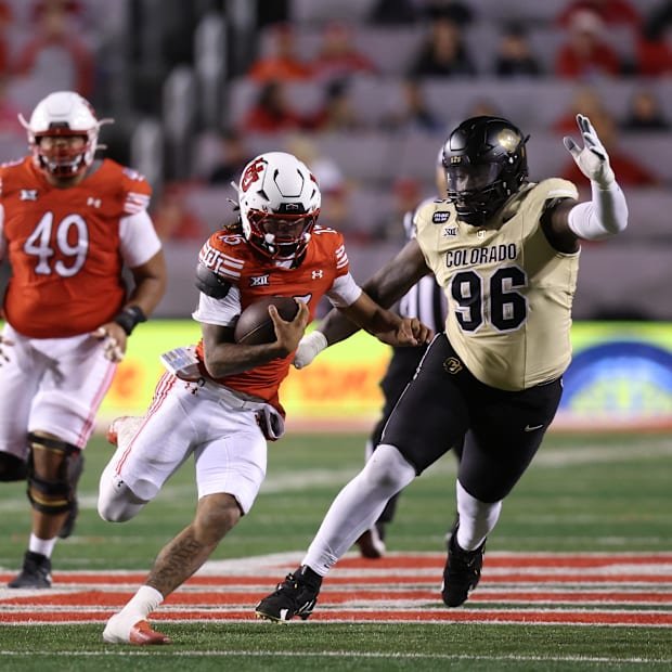 Oct 25, 2025; Salt Lake City, Utah, USA; Utah Utes quarterback Byrd Ficklin (15) runs against Colorado Buffaloes defensive li