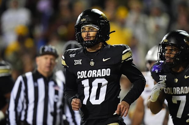 Nov 22, 2025; Boulder, Colorado, USA; Colorado Buffaloes quarterback Julian Lewis (10) following his third quarter touchdown 
