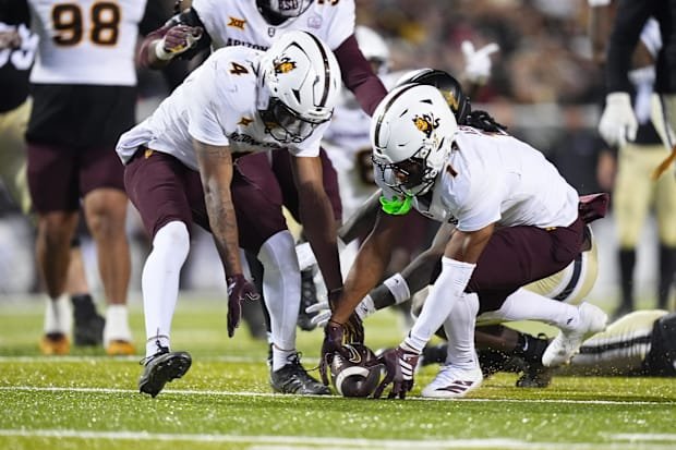 Nov 22, 2025; Boulder, Colorado, USA; Arizona State Sun Devils defensive back Keith Abney II (1) and safety Myles Rowser (4) 