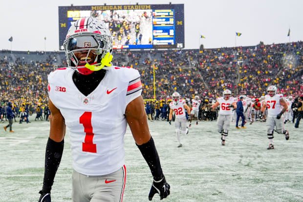 Ohio State Buckeyes cornerback Davison Igbinosun (1) celebrates after defeating the Michigan Wolverines in the NCAA football 