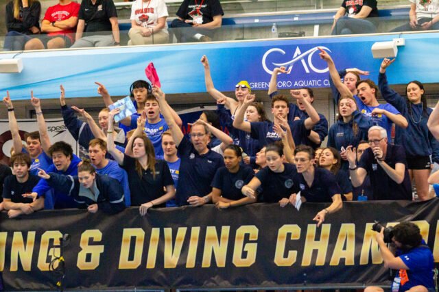 College swimmers racing in NCAA pool event
