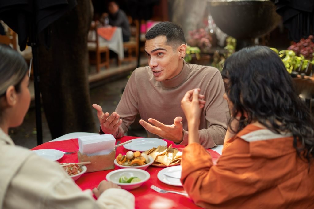 Customers are enjoying food in group discount offer in empty hour
